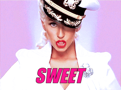 a woman wearing a hat and a white jacket with the word sweet above her