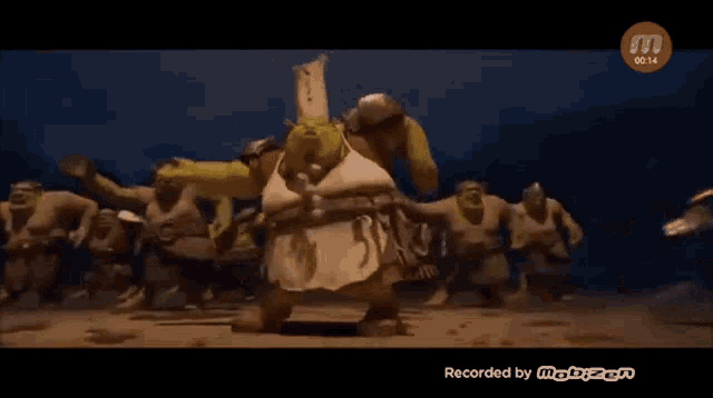a group of shrek characters are dancing in a video recorded by mobizen
