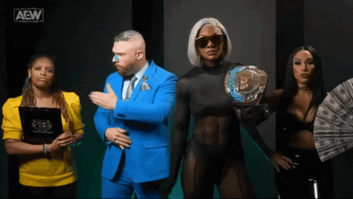 a group of people standing next to each other with the aew logo on the bottom