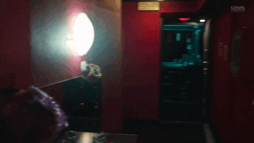 a blurred image of a room with a hbo logo on the bottom