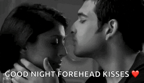 a black and white photo of a man and woman kissing with the words good night forehead kisses .