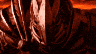 a close up of a person 's face in a red background