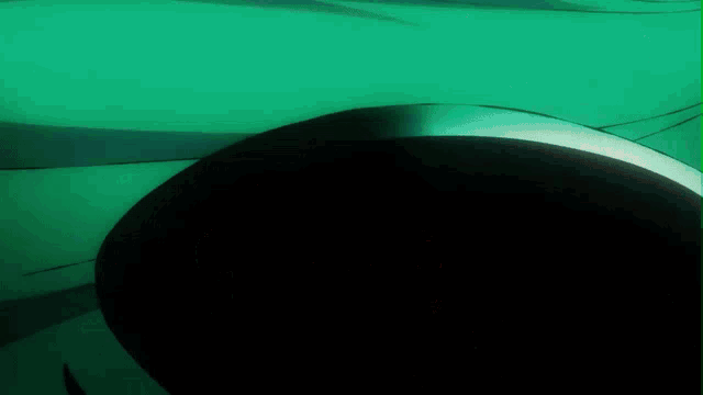 a green background with a black circle in the middle of it