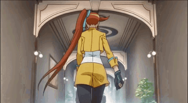a cartoon character with red hair and a yellow jacket is walking down a hallway