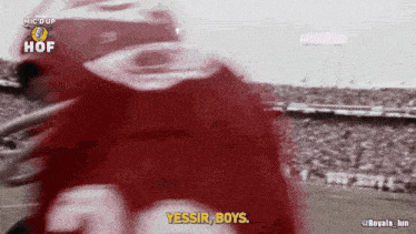 a black and white photo of a football player with the words yessir boys below him
