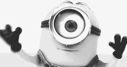 a black and white photo of a minion wearing a pair of goggles .