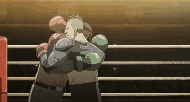 two boxers hugging in a boxing ring with one wearing a glove that says ' pa ' on it