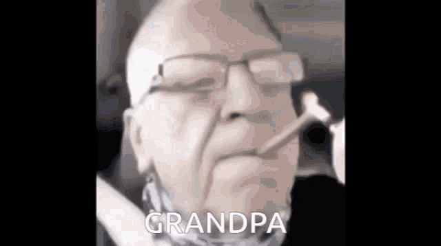 an elderly man wearing glasses is smoking a cigarette and says `` grandpa '' .