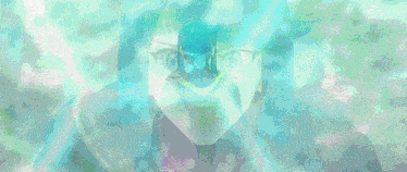 a close up of a person with blue hair