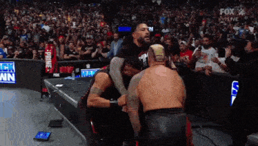 a fox live broadcast of a wrestling match is shown