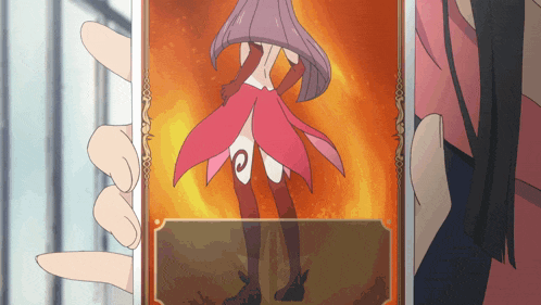 a person is holding a cellphone with a picture of a girl on it