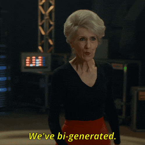 a woman says we 've bi-generated in a black shirt and red skirt