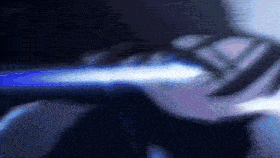 a blurred image of a person holding a blue object