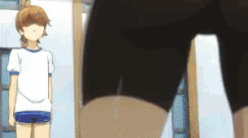 a girl in a white shirt is standing in front of a mirror .