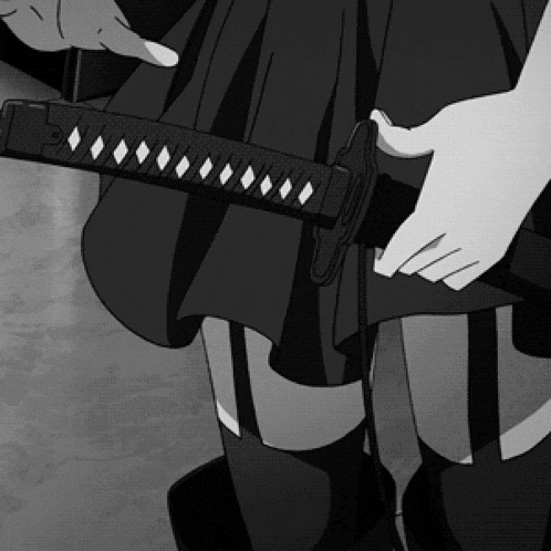 a person holding a sword with diamonds on the handle