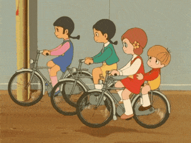 a group of children are riding bicycles in a room