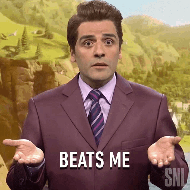 a man in a purple suit and tie says beats me