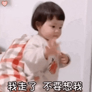 a little girl is sitting on a bed and making a funny face with her hands .