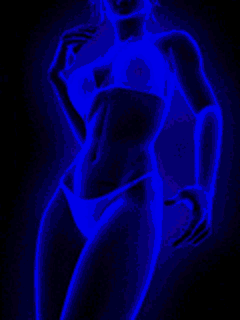 a woman in a bikini is lit up in green