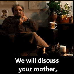 a man sitting on a couch with the words " we will discuss your mother " on the bottom
