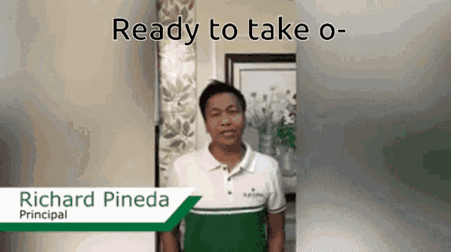 a man in a green and white shirt is standing in front of a sign that says richard pineda principal
