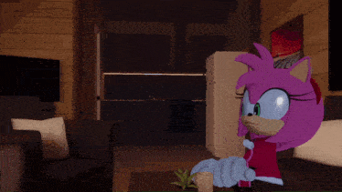amy the hedgehog is sitting on a couch in a room
