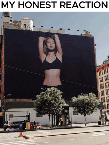 a billboard for calvin klein shows a woman in a bra