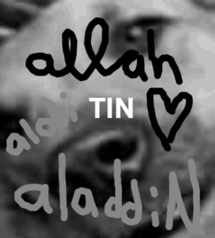 a black and white photo of a man with the words allah tin aladdin written on it