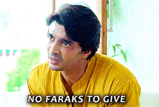 a man in a yellow shirt with the words no faraks to give behind him