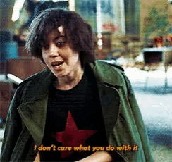 a woman in a green jacket says i don 't care what you do with it .