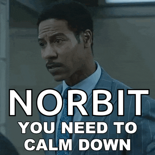 a man in a suit and tie with the words norbit you need to calm down below him