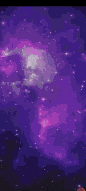 a man with pink hair and sunglasses is sitting in front of a purple galaxy