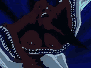 a cartoon character is being attacked by a monster with a huge mouth .