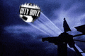 a city boyz logo is being projected onto a building