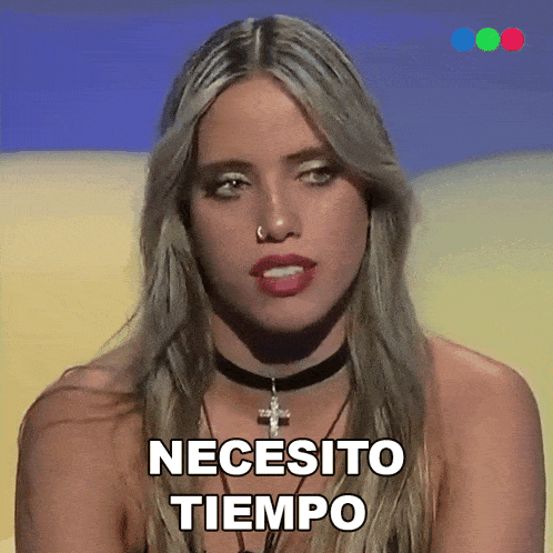 a woman wearing a choker and a cross necklace says " necesito tiempo "