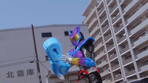 a purple and blue superhero stands in front of a building with chinese writing