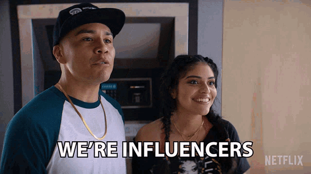 a man and a woman are standing next to each other with the words we 're influencers written on the bottom