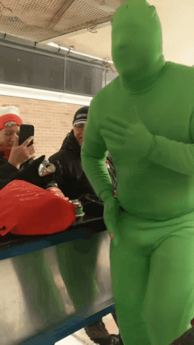 Green Man Suit Strolling GIF - Green Man Suit Strolling Effl GIFs