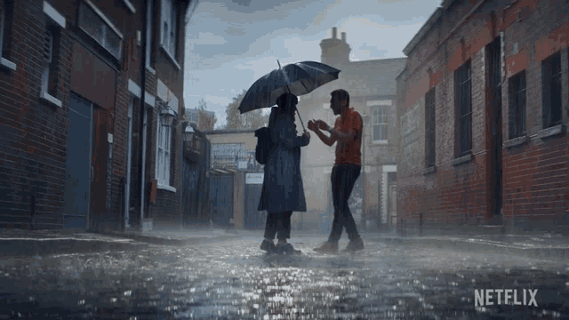 a man and woman holding an umbrella in the rain with a netflix logo in the corner