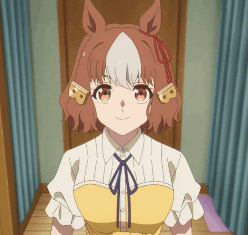 a girl with a horse ear and the letter b on her ear is smiling