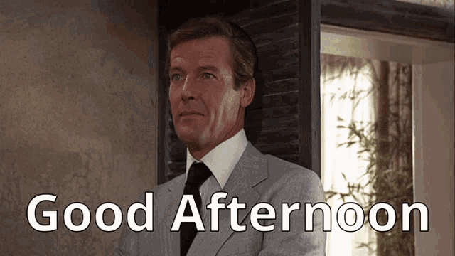 Good Afternoon Roger Moore GIF - Good Afternoon Roger Moore The Man With The Golden Gun GIFs