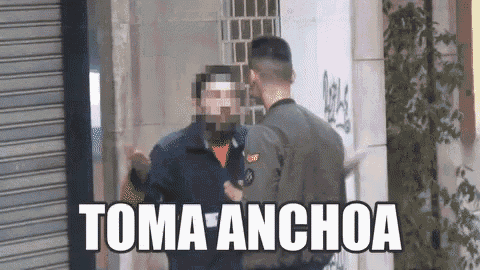 a man talking to another man with the words toma anchoa written on the bottom