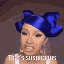 a woman with blue hair is wearing a blue hat and saying that 's suspicious .