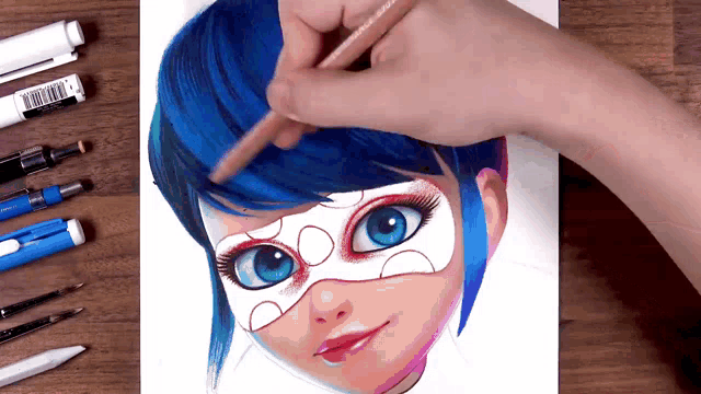 a person drawing a ladybug with blue hair