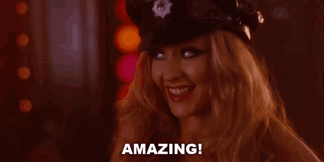 a woman in a police hat says " amazing "