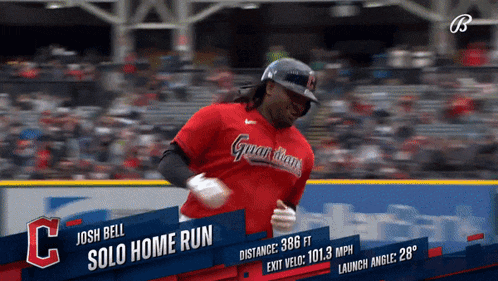 a baseball player named josh bell is running on a field