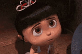 a little girl from the movie despicable me is wearing a tutu and a bow in her hair .