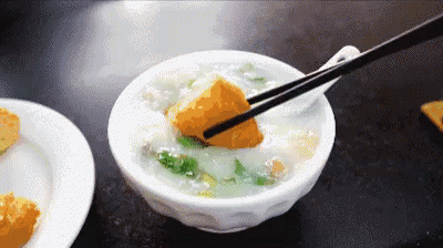 粥 油條 沾 好吃 GIF - Congee Dip It In Chopsticks GIFs