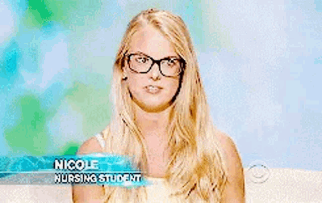 a woman wearing glasses and a name tag that says nicole nursing student .