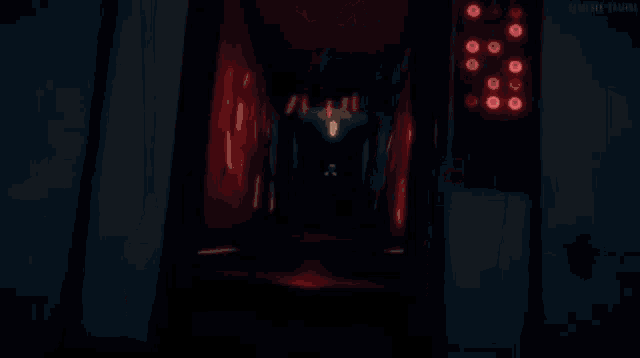 a blurry picture of a woman in a bikini standing in a room